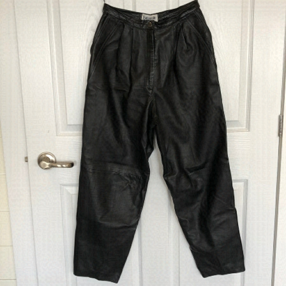 leather pants trouser style with pleats and pockets. Fully lined